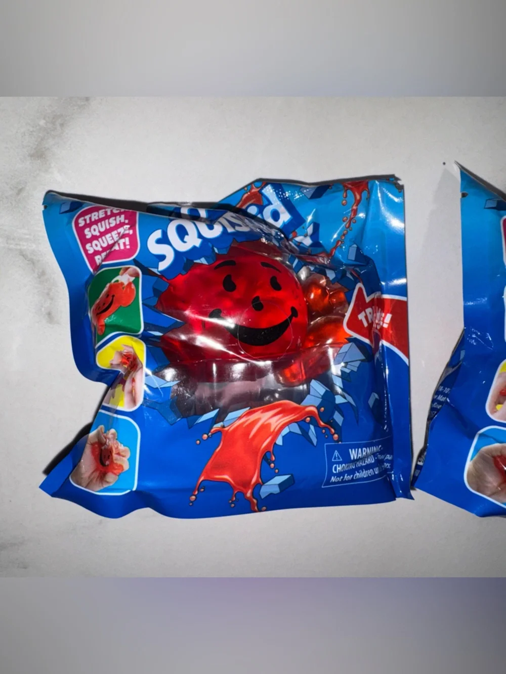 Kool-Aid scented Squeeze Surprise Red Squeezable Toy - Kids Learning Toy